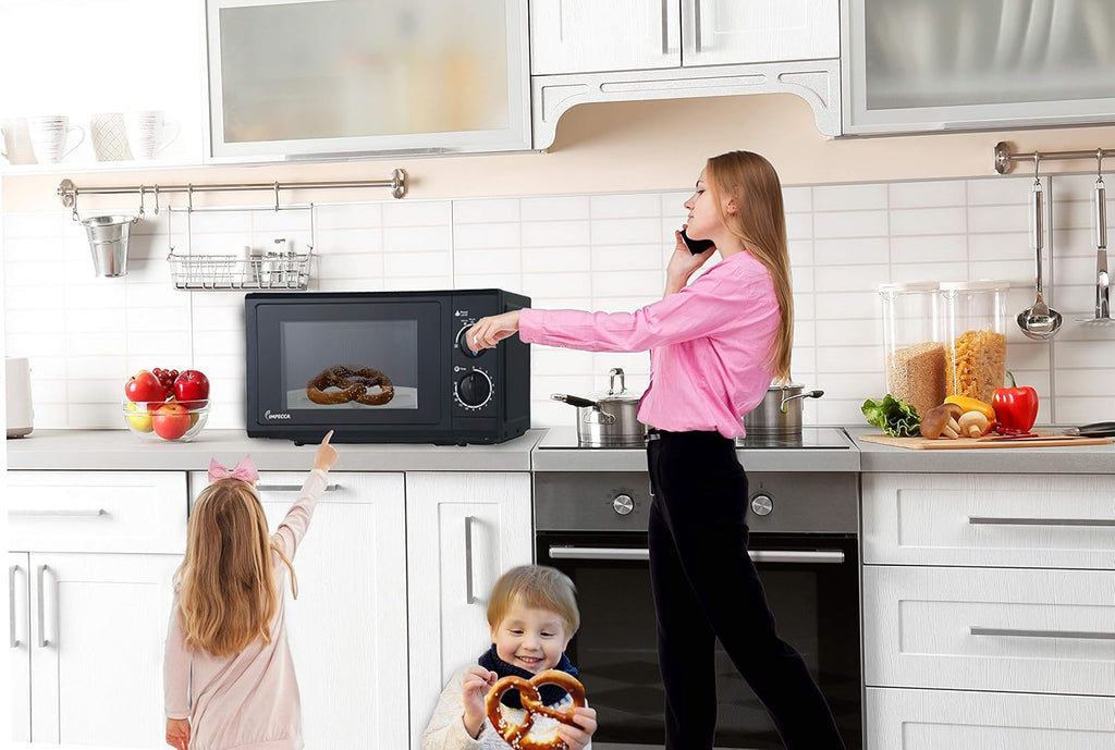700-Watts 0.6 Cubic Feet Black Microwave Oven R824863